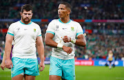 The Spingboks' Marco van Staden and Manie Libbok leave the field after their Rugby World Cup pool B match against Ireland at Stade de France on Saturday.