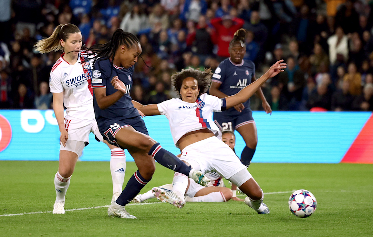 Paris Saint-Germain's Marie-Antoinette Katoto scores against Lyon during their UEFA Champions League semi-final