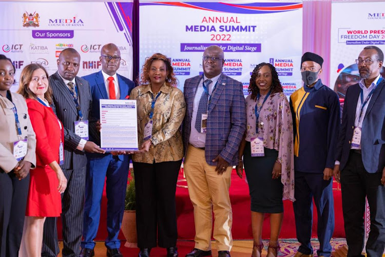 Media Council CEO David Omwoyo (3rd Left) presides over the launching of the Intermedia Charter on Safety and Protection of Journalists at Safari Park Hotel, Nairobi, on May 5