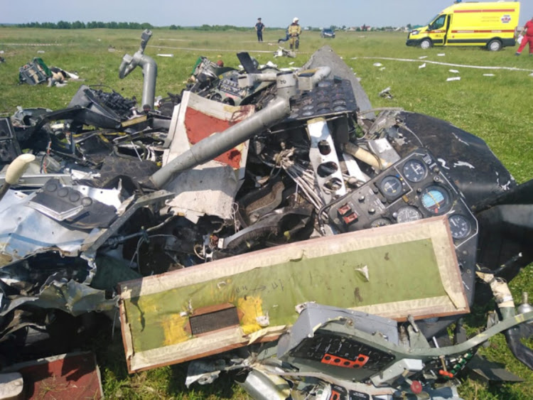 A view shows the wreckage of an L-410 plane that crashed near the Tanay aerodrome, which provides parachuting services, in Kemerovo Region, Russia June 19, 2021.