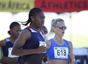 Caster Semenya and Dominique Scott during the 5,000m at the SA championships in Cape Town in April.