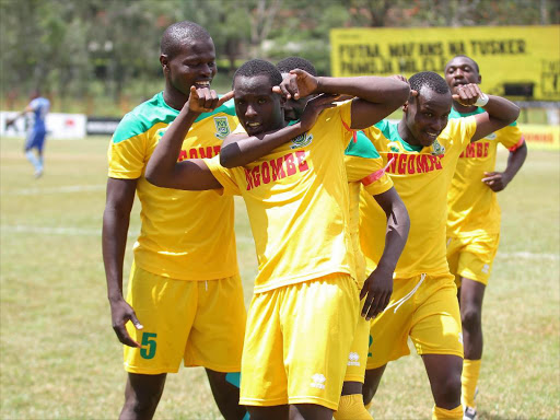 Mathare United’s Cliff Nyakeya Celebrates with teammates after scoring against Nakumatt FC / OLIVER MORGAN