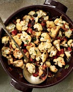 Pan-Roasted Cauliflower with Pine Nuts and Raisins was pinched from <a href="http://www.foodandwine.com/recipes/pan-roasted-cauliflower-with-pine-nuts-and-raisins" target="_blank">www.foodandwine.com.</a>