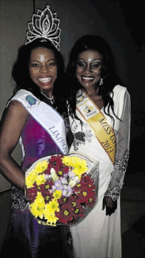 BORN WINNER: Israel Mulaudzi with former Miss Gauteng Dr Laverne Asante photo: BENSON NTLEMO