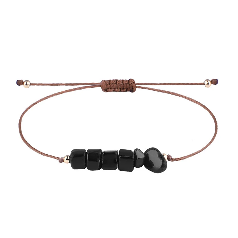 Armband met onregelmatige ruwe stenen en geweven gewaxte draad, Boho stijl, natuurlijke elegantie, verstelbaar.