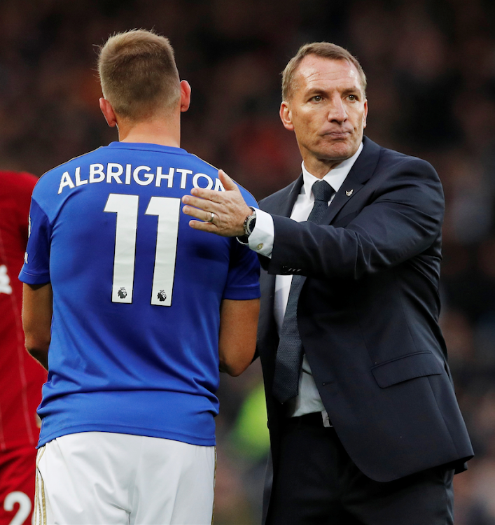 Leicester City manager Brendan Rodgers shakes hands with Marc Albrighton