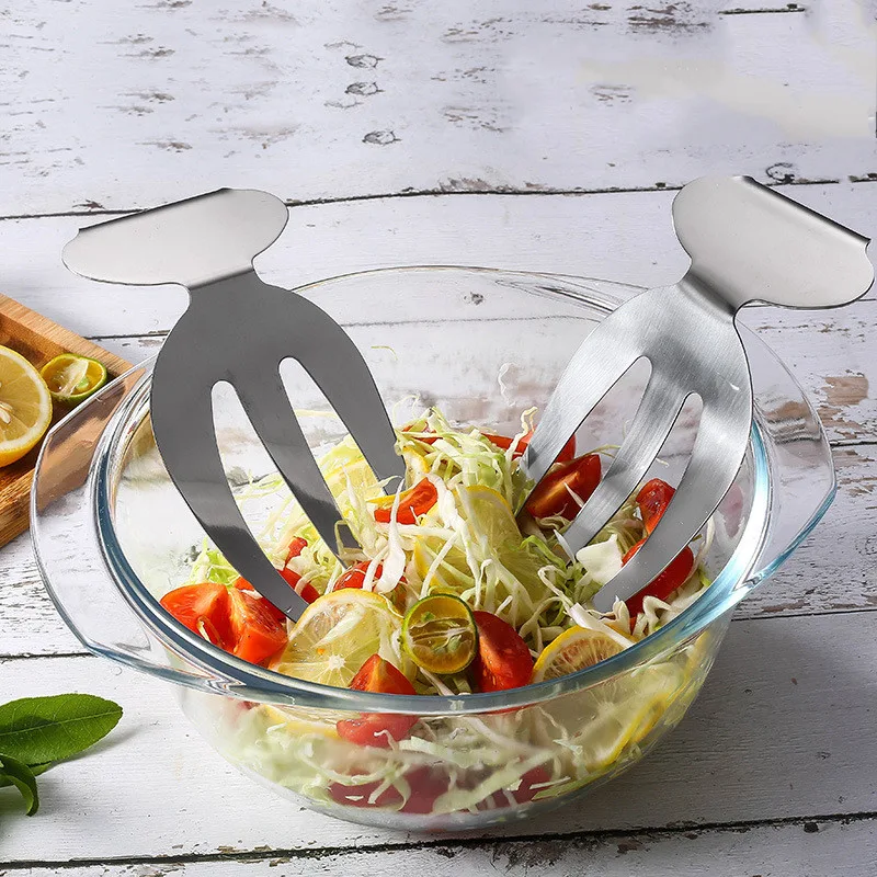 Creatieve RVS Salade Mengvork Keukenhulp. Perfect voor het mengen, serveren en bereiden van heerlijke, verse salades eenvoudig. Duurzaam en stijlvol.