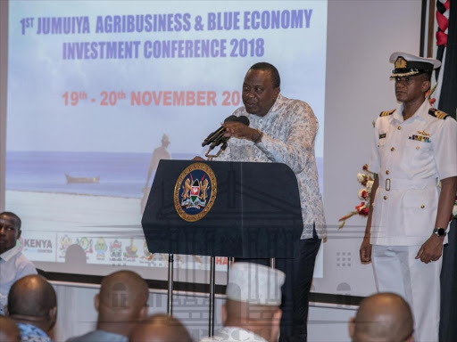 President Uhuru Kenyatta speaks at the Jumuiya Agribusiness and Blue Economy Investment Conference in Mombasa on Monday, November 19, 2018. /PSCU