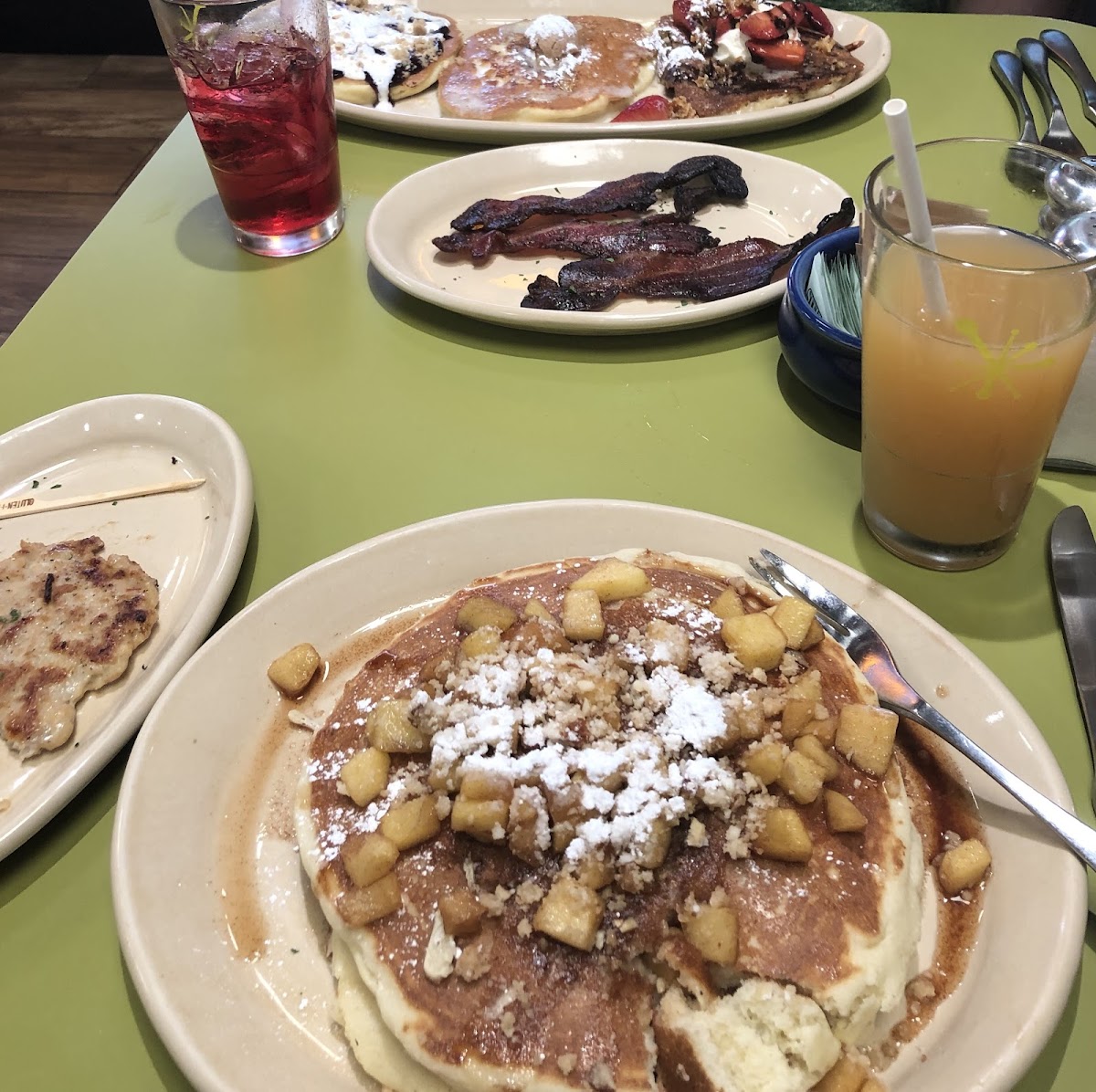 Pancake flight, bacon, chicken sausage, and pancake of the day.