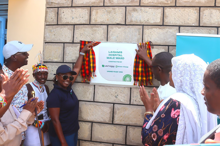 Marsabit Deputy Governor Solomon Gubo with Lake Turkana Wind Power Chief Finance officer Alice Wathika and CECM Health Grace Galmo Boru while opening Laisamis male ward on Wednesday May 15, 2024 .