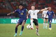 Ryan Isaac Da Graça Mendes of Cape Verde challenges Emam Ashour of Egypt during the 2023 Africa Cup of Nations match  at Felix Houphouet Boigny Stadium in Abidjan, Ivory Coast on 22 January 2024.