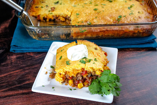 Mexican Cornbread Casserole on a plate.