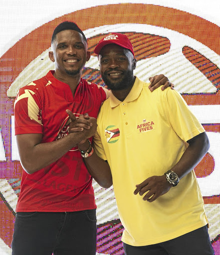 Castle five-a-side ambassador Samuel Eto'o and Tinashe Nengomasha at the launch yesterday.