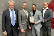 Prosecutor Robin Lewis, second from right, with, from left, Western Cape deputy director of public prosecutions Dave Damerell, and Michael Burgin and Ultrich Kruger of the US Secret Service.