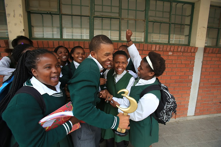 Boxer Azinga Fuzile with his Kusile Comprehensive School friends earlier this year.