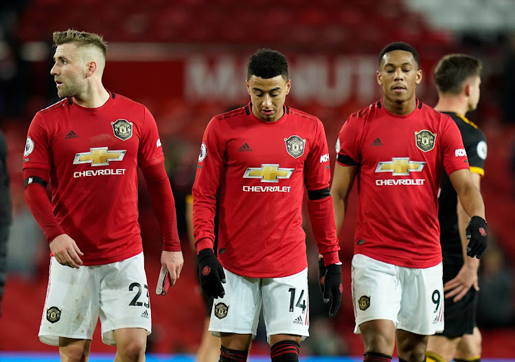 Manchester United's Luke Shaw, Jesse Lingard and Mason Greenwood