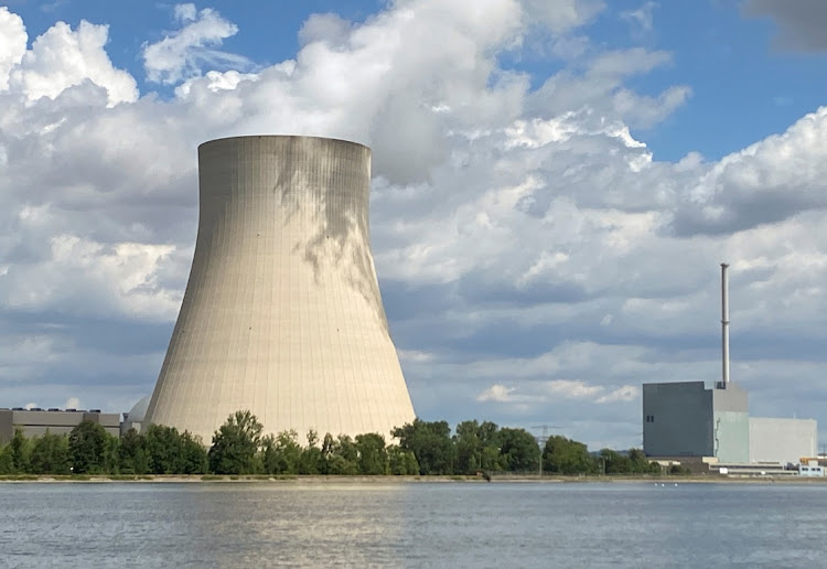 Clouds are seen over the cooling tower of the nuclear power plant Isar 2 by the river Isar amid the energy crisis caused by Russia's invasion of Ukraine, in Eschenbach near Landshut, Germany, August 1, 2022.