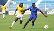 Mamelodi Sundowns striker Peter Shalulile challenges Altayeb Abdelrazig Abdalla of Al Hilal during their CAF Champions League clash at Al Hilal Stadium in Omdurman, Sudan.