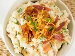 Loaded Baked Potato Salad was pinched from <a href="http://www.browneyedbaker.com/2013/07/02/loaded-baked-potato-salad-recipe/" target="_blank">www.browneyedbaker.com.</a>