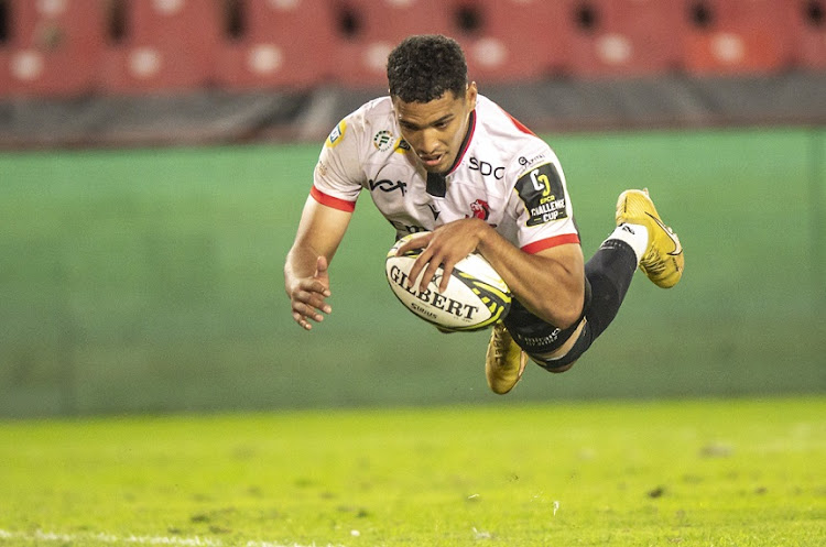 Gianni Lombard of the Lions scores his try in the EPCR Challenge Cup match aganist Racing 92 at Ellis Park on April 1 2023.