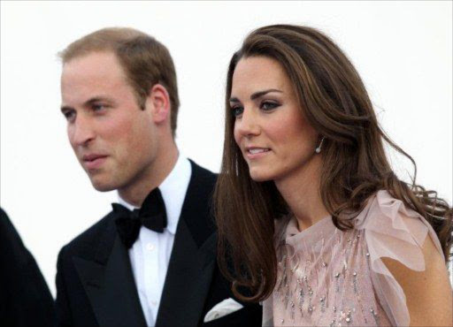 Britain's Duke and Duchess of Cambridge, Prince William (L) and Catherine, arrive for a charity gala dinner, their first official royal engagement at Kensington Palace in London.