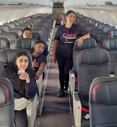 Namritha Sivsanker (right) with some of the Hope SA Foundation volunteers on aboard a Turkish Airlines flight from Istanbul to Gaziantep