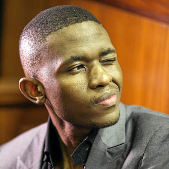 Murderer Sandile Mantsoe winks in court. File photo.