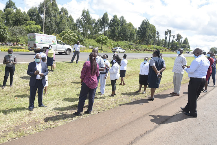 Some of the medics who were held at Blue Post roadblock in Thika on Tuesday morning