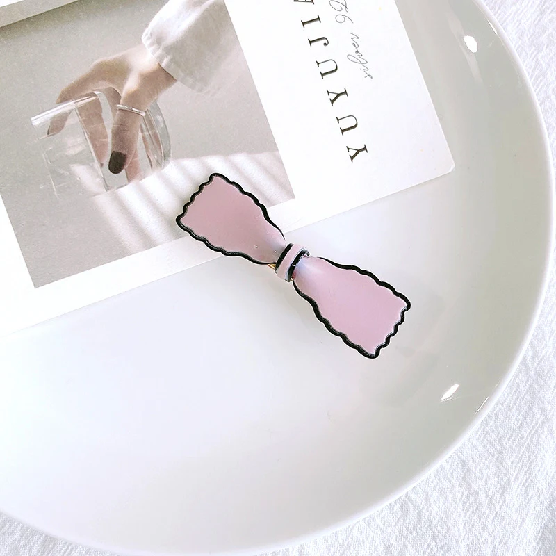 Koreaanse haarspeld met strik en eendenbekclip, haaraccessoires voor dames, biedt een stevige grip en een stijlvolle uitstraling.