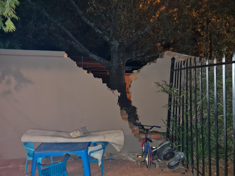 Destruction to one of the homes affected by the sinkhole.