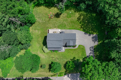 Aerial view house surrounded by trees in this luxury house for sale in Scarborough ($950,000)