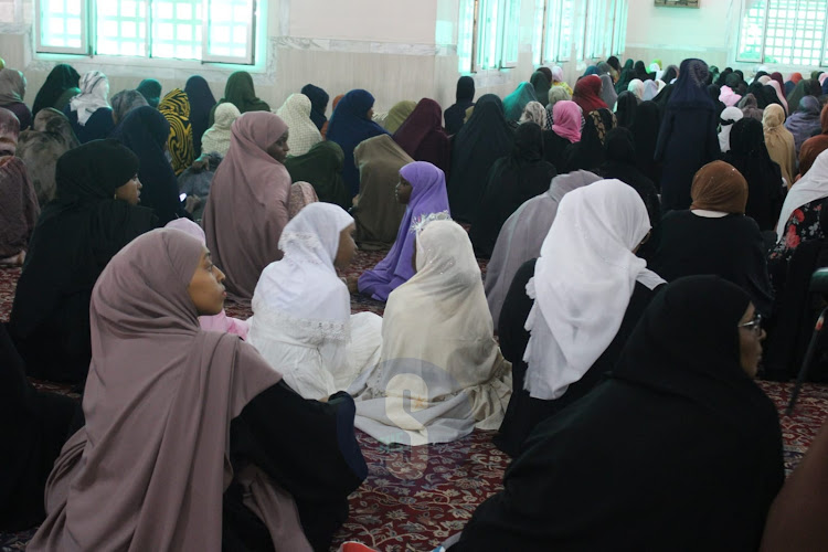 Muslim women gather before prayers to mark the end of the holy fasting month of Ramadhan at Jamia mosque, Nairobi on April 10, 2024