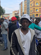 John Babiwala slept outside the building last night with the hope of saving some of his belongings from the fire-ravaged building.