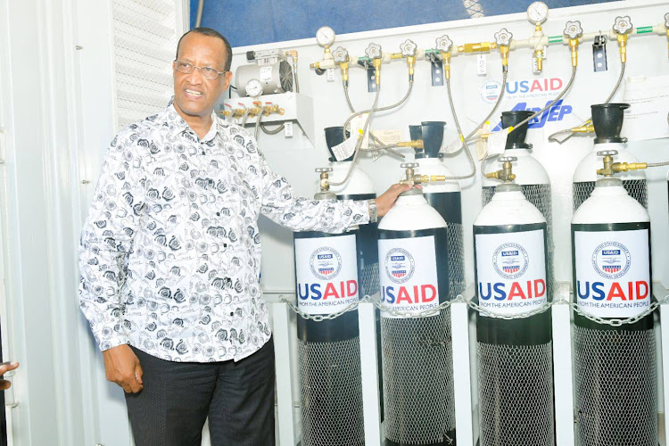 Garissa Governor Nathif Jama admires some of the oxygen plants at Garissa County Referral Hospital.