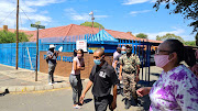 Parents have gathered outside the Mayfair, Johannesburg, school where a schoolgirl was allegedly kidnapped at gunpoint on Wednesday morning.