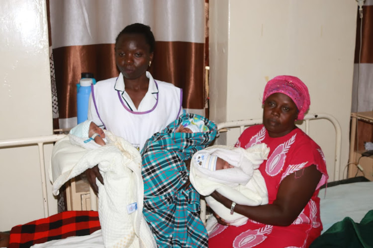 Nanjlas mother with medics at lugulu