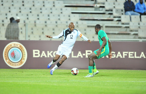 Lemponye Tshireletso of Botswana challenged by Tercious Male of South Africa during 2017 Cosafa Castle Cup match between Botswana and South Africa at Moruleng Stadium in Rustenburg on 04 July 2017. Samuel Shivambu/BackpagePix