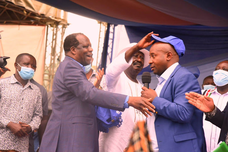 Kakamega Governor Wycliffe Oparanya, ODM leader Raila Odinga and Lugari MP Ayub Savula at Bukhungu Stadium