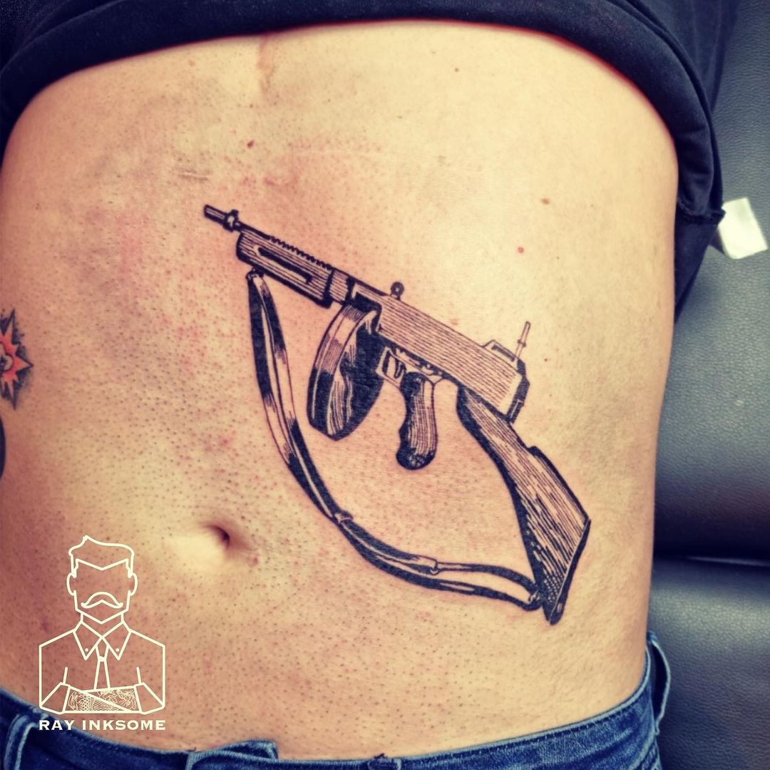 Cool Machine Gun Tattoo