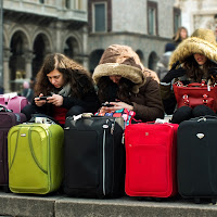 Valige, telefoni, cappucci di 