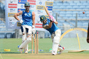 Faf du Plessis captain of South Africa playing a shot during the South African national men's cricket team training session and press conference at Maharashtra Cricket Association Stadium on October 08, 2019 in Pune, India. 