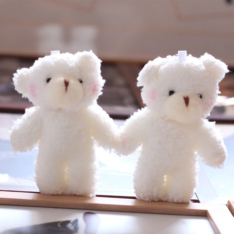 Mini poupée ours en peluche porte-clés pour sac Un adorable compagnon, idéal pour ajouter une touche de tendresse à vos clés ou à votre sac à main.