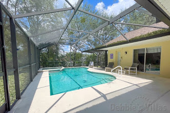 Secluded sunny pool and spa deck at this Clermont vacation villa