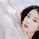 IU in a pink blouse