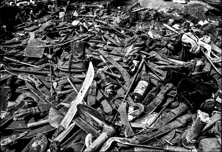 Machetes, pangas and other implements confiscated from Rwandan Hutus at the Zairian border, 1994. These are just some of the weapons used to carry out the genocide against Tutsis in neighbouring Rwanda.