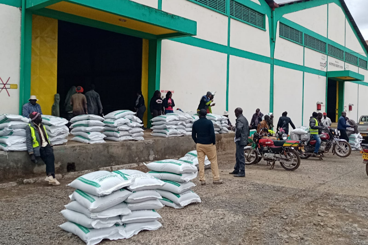 Farmers collect subsidised fertiliser at NCPB depot in Eldoret.