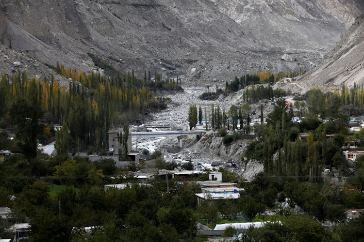 A view of the newly built Hassanabad bridge, which replaced a bridge that collapsed when the Shisper glacier caused glacial lake outburst flooding, in Hassanabad village, Hunza valley, in the Karakoram mountain range, in the Gilgit-Baltistan region of Pakistan, in this photo taken on October 8 2023. REUTERS/AKHTAR SOOMRO