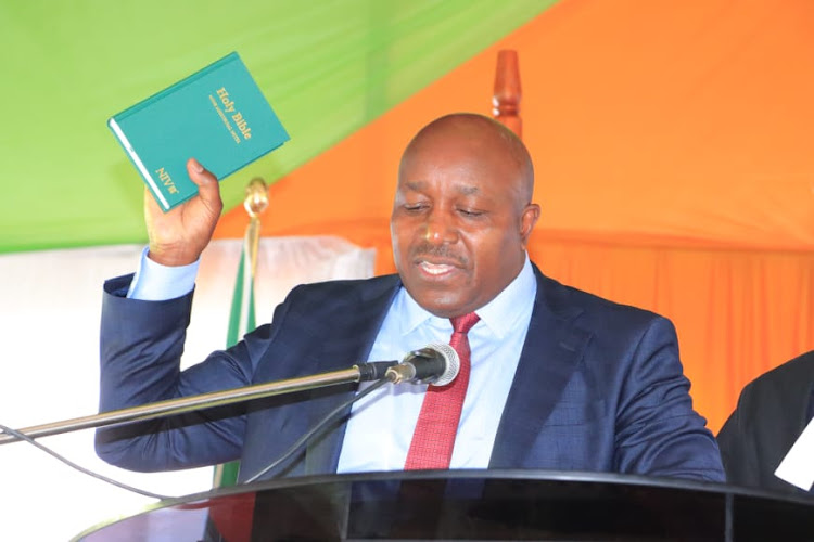 Embu Deputy Governor Justus Kinyua takes oath of office on Thursday.