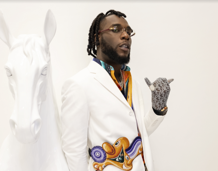 Nigerian star Burna Boy's name was dragged into a war of words over load-shedding.