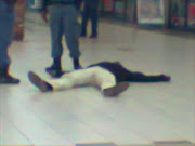 The body of a man who was killed at Kagiso Mall.